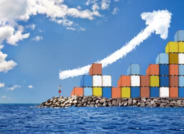 port containers on shore with image depicting inflation and its effect on global supply chain