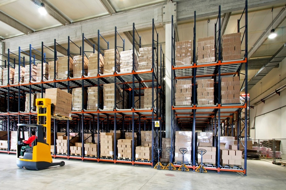 Racked storage with forklift by new england warehouse