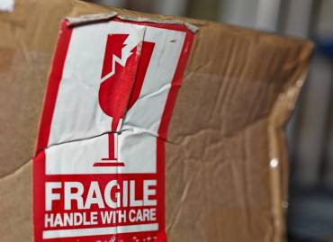 Damaged freight package after using a cheap freight carrier