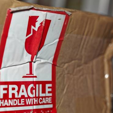 Damaged freight package after using a cheap freight carrier