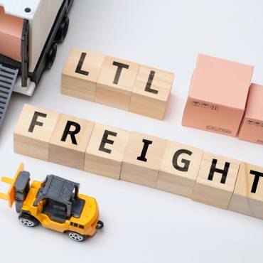 Multi-carrier shipping with fedex, DHL, and UPS shipping packages on a table